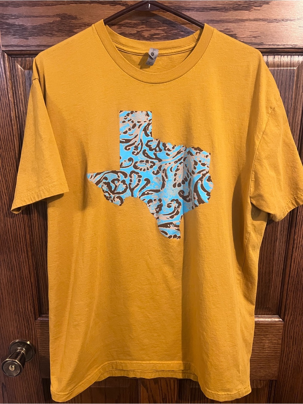 Next Level Apparel Mustard Yellow Short Sleeve Tee with Turquoise Texas Graphic